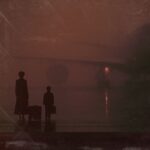 Silhouette of mother and child standing on foggy airport tarmac, representing the Turkey holiday incident and childhood abuse evidence.