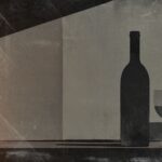 a wine bottle and two glasses