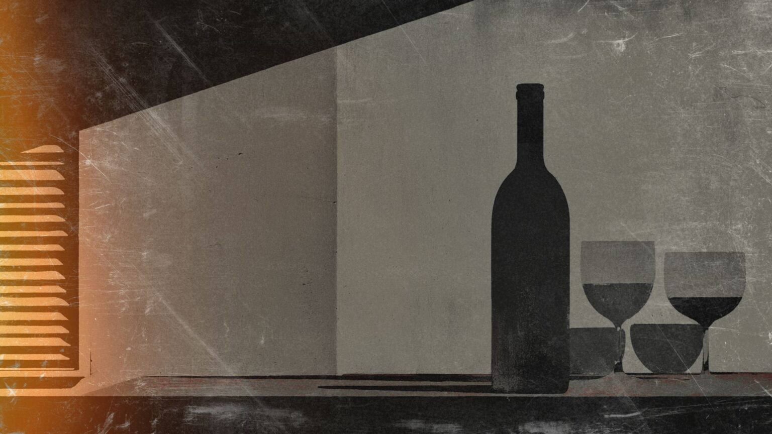 a wine bottle and two glasses